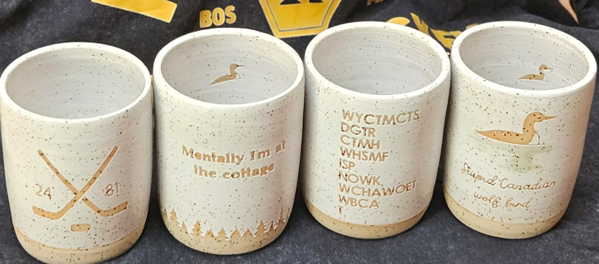 The complete Heated Rivalry mug collection 💙❤️🤍💛🖤