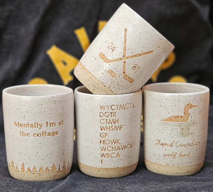 The complete Heated Rivalry mug collection 💙❤️🤍💛🖤